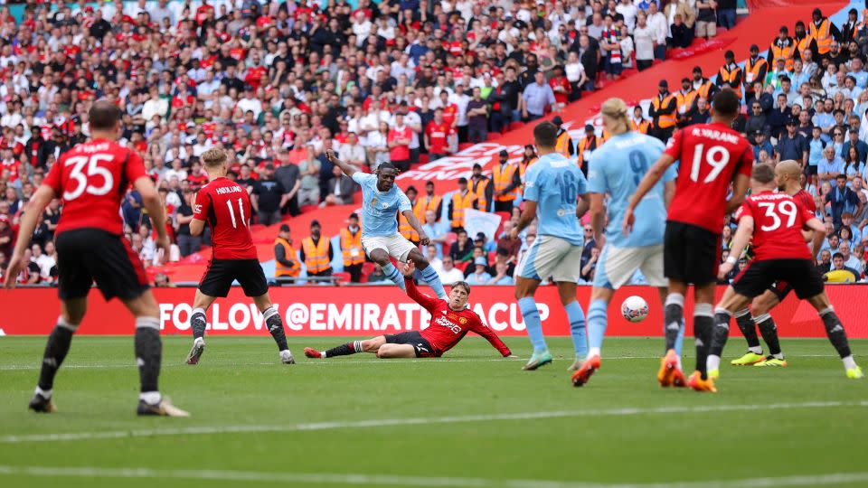 Jeremy Doku scored a late goal for Manchester City to set up a grandstand finish. - Alex Pantling/Getty Images