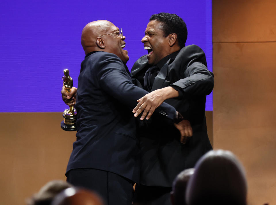 Samuel L. Jackson and Denzel Washington speak onstage during the 2022 Governors Awards at The Ray Dolby Ballroom at Hollywood & Highland Center on March 25, 2022 in Hollywood, California. - Credit: Mike Coppola/Getty Images