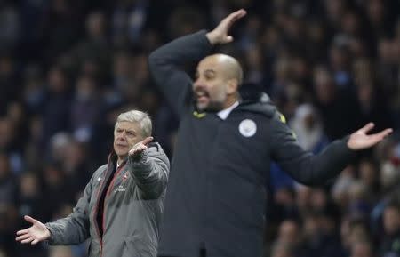 Britain Football Soccer - Manchester City v Arsenal - Premier League - Etihad Stadium - 18/12/16 Arsenal manager Arsene Wenger and Manchester City manager Pep Guardiola Action Images via Reuters / Carl Recine Livepic