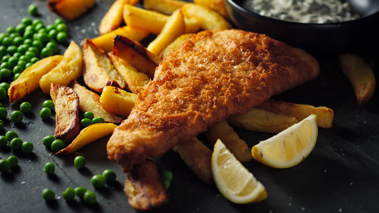 Fried fish peas and potatoes