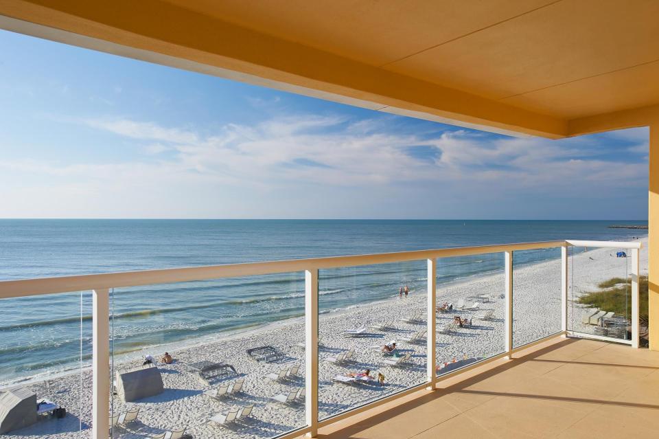 Edgewater Beach Hotel’s glass-walled balconies maximize Gulf-front views.