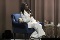 Former first lady Michelle Obama speaks at the "Becoming: An Intimate Conversation with Michelle Obama" event at the Forum on Thursday, Nov. 15, 2018, in Inglewood, Calif. (Photo by Willy Sanjuan/Invision/AP)