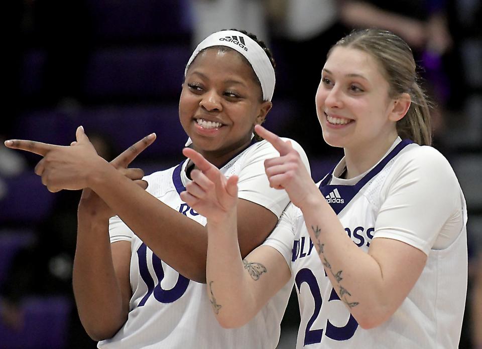 Holy Cross' Janelle Allen, left, and Grace Munt celebrate their victory over Loyola in a Patriot League Tournament semifinal Thursday.