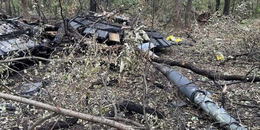 Destroyed Russian tank somewhere in Ukrainian woods