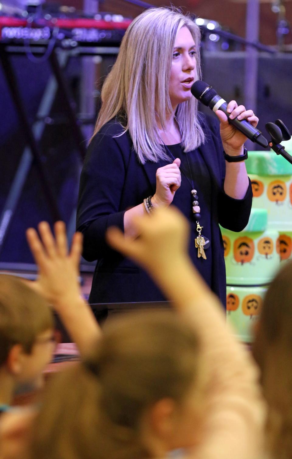 Principal Victoria Ahearn speaks to student during chapel at the Shelby campus of Gaston Christian School Thursday morning, Feb. 2, 2023.