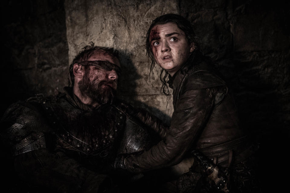 This image released by HBO shows Maisie Williams, right, and Richard Dormer in a scene from "Game of Thrones," that aired Sunday, April 28, 2019. In the Associated Press' weekly "Wealth of Westeros" series, we're following the HBO fantasy show's latest plot twists and analyzing the economic and business forces driving the story. This week, Arya’s triumphant assassination of the king ice zombie has prompted an appreciation among us for the role of skills, in economics as well as medieval Westeros. (Helen Sloan/HBO via AP)