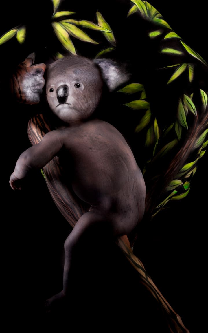 *** MANDATORY BYLINE PIC BY MARK RUPPELT/ CATERS NEWS *** (Pictured: Koala bear bodyart by Gesine Marwedel) - These incredible realistic animal paintings using HUMAN BODIES as a canvas will blow your mind. At first glance, they just look like amazingly detailed animal artworks  but on closer inspection you can see models limbs being cleverly camouflaged by paint. The cleverly designed animal paintings - including a turtle on the beach, koala in a tree and a sleeping red panda - each contain a cunningly concealed person, cleverly blending into the background. The intricate works of art can take anywhere from four hours to more than 12 hours to complete  but after a photoshoot theyre washed away in minutes. SEE CATERS COPY