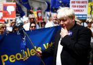 A man resembling Britain's Foreign Secretary Boris Johnson, joins EU supporters, calling on the government to give Britons a vote on the final Brexit deal, participates in the 'People's Vote' march in central London, Britain June 23, 2018. REUTERS/Henry Nicholls