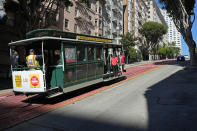 A cable car makes its way up Powell Street toward Nob Hill in San Francisco, Wednesday, Oct. 18, 2023. A $4 million marketing campaign touting San Francisco's resilience, innovation and moxie launches Thursday, Oct. 19, as the embattled city prepares to host a high-profile Asia-Pacific Economic Cooperation leaders' summit next month that could boost its image or pile on to its woes. (AP Photo/Eric Risberg)