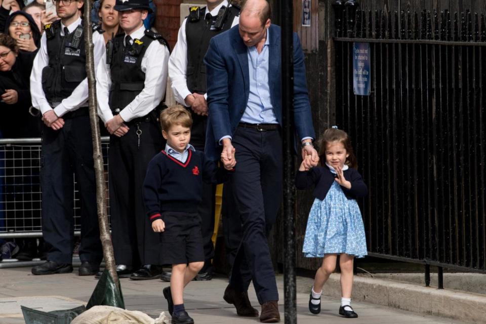 He could also be seen standing by as Prince George and Princess Charlotte came to meet their new brother (Getty Images)