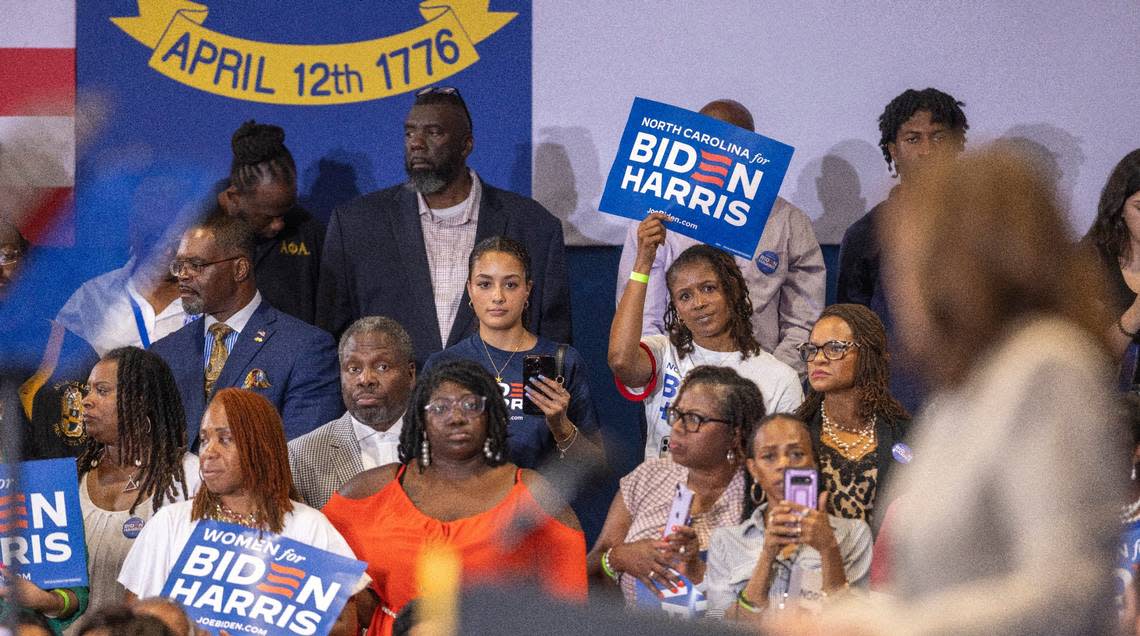 Rally attendees listen as Vice President Kamala Harris delivers her remarks at Westover High School on Thursday, July 18, 2024 in Fayetteville, N.C.