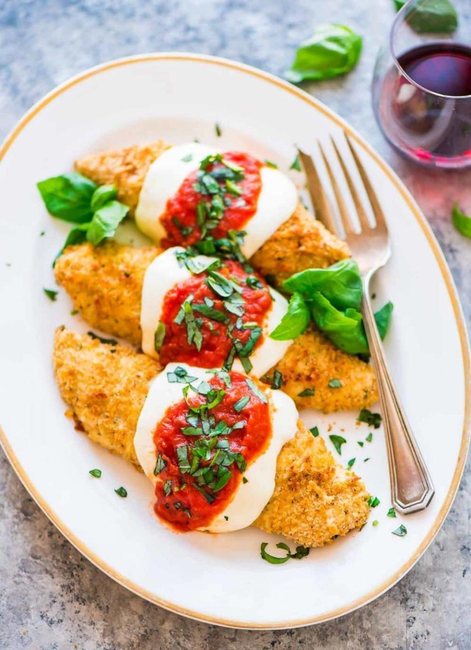 <strong>Get the <a href="https://www.wellplated.com/baked-chicken-parmesan/" target="_blank">Baked Chicken Parmesan</a> recipe from Well Plated</strong>