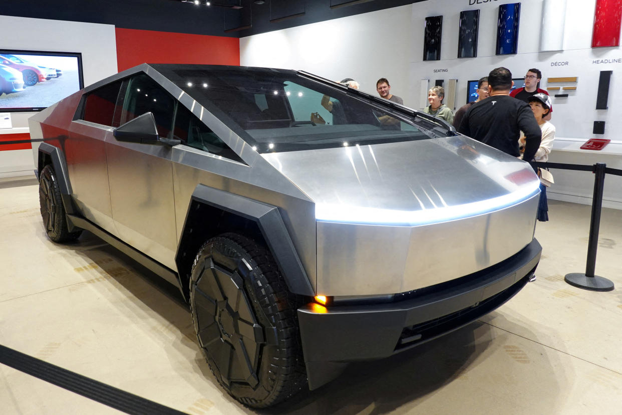 FILE PHOTO: Tesla's new Cybertruck is shown on display at a Tesla store in San Diego, California, U.S., November 20, 2023.  REUTERS/Mike Blake/File Photo