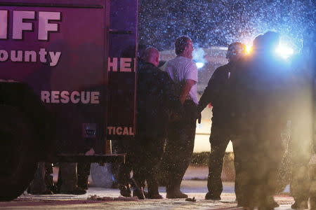 A suspect is taken into custody outside a Planned Parenthood center in Colorado Springs, November 27, 2015. REUTERS/Isaiah J. Downing