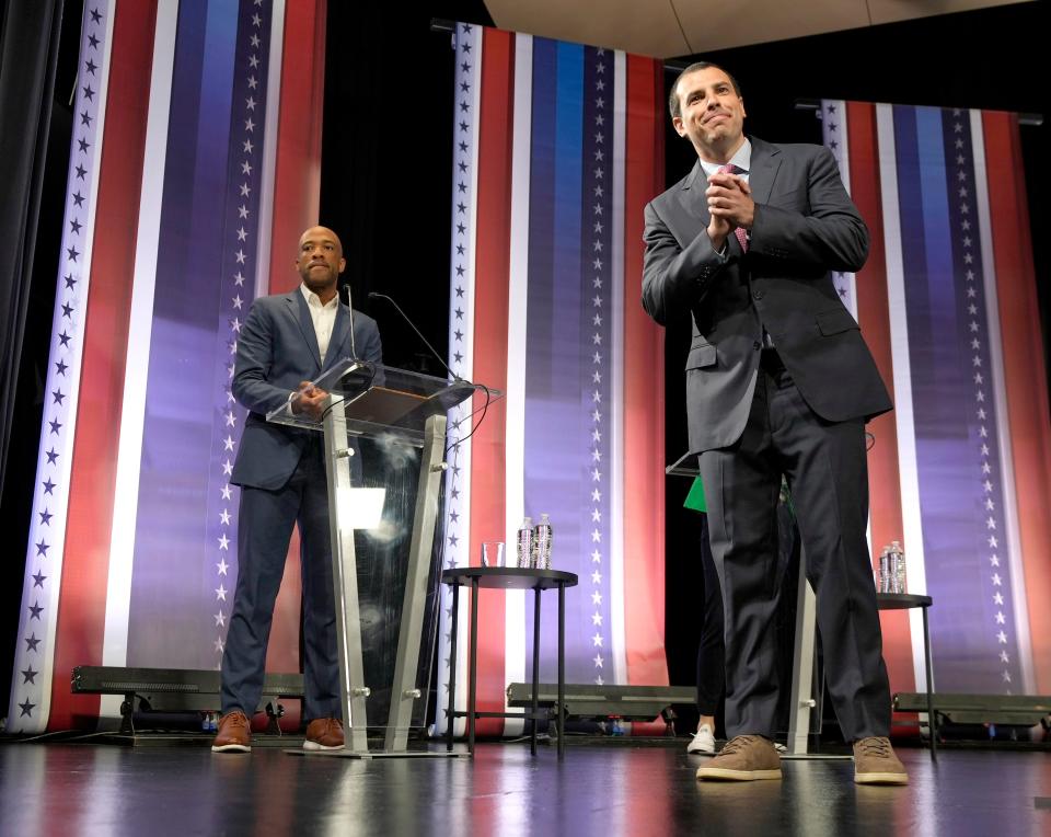 Milwaukee Bucks executive Alex Lasry enters the stage during the Democratic U.S. Senate debate at Marquette University's Varsity Theatre in Milwaukee on Sunday, July 17, 2022. It was the first televised debate of Wisconsin's campaign season before the Aug. 9 primary.