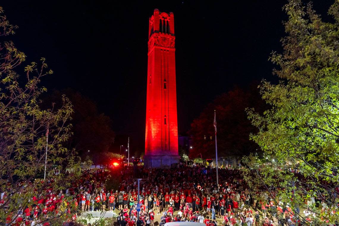 NC State fans celebrate at the Memorial Belltower on campus after the men’s basketball team’s 76-64 win over Duke to advance to the Final Four in the NCAA Men’s Division I Basketball Tournament on Sunday, March 31, 2024.