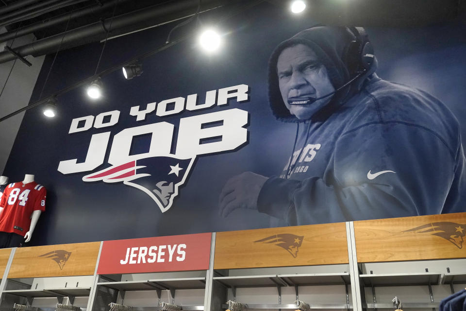 A mural with a likeness of New England Patriots head coach Bill Belichick is featured on a wall, Thursday, Jan. 11, 2024, at the Patriots ProShop in Foxborough, Mass. Six-time NFL champion Bill Belichick has agreed to part ways as the coach of the New England Patriots on Thursday, bringing an end to his 24-year tenure as the architect of the most decorated dynasty of the league's Super Bowl era, a source told the Associated Press on the condition of anonymity because it has not yet been announced. (AP Photo/Steven Senne)