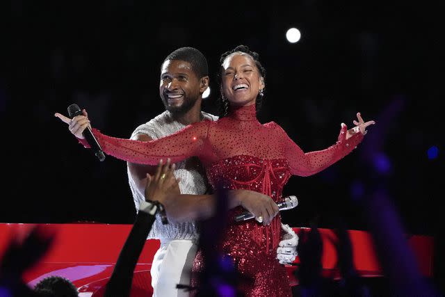 <p>TIMOTHY A. CLARY/AFP via Getty</p> Usher and Alicia Keys perform during the Super Bowl Halftime Show in Las Vegas on Feb. 11, 2024