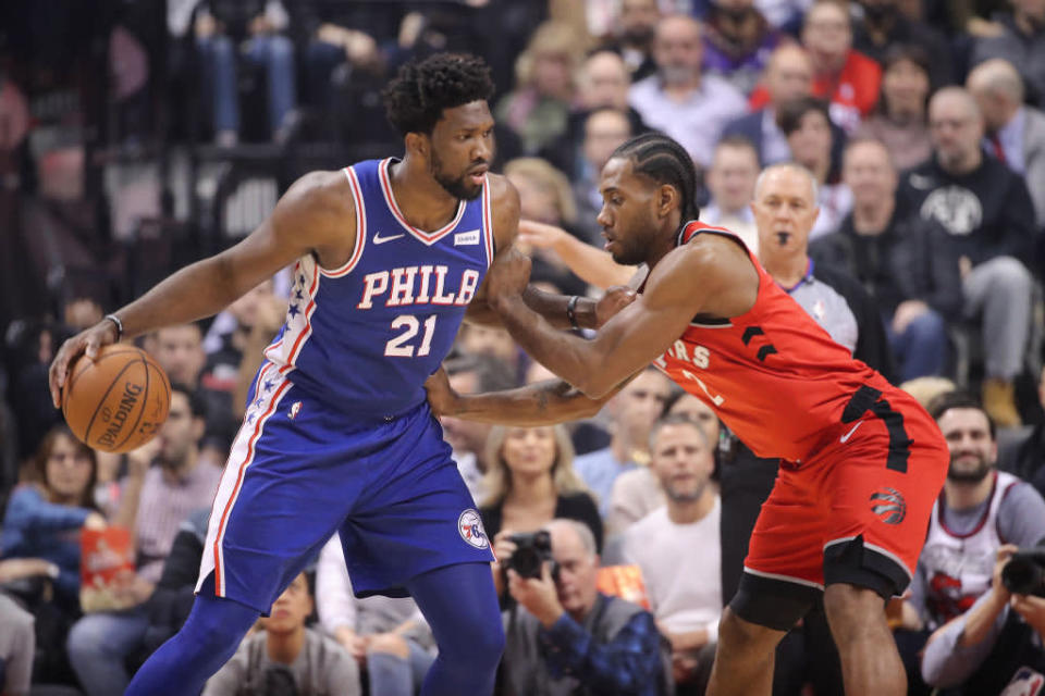 Joel Embiid and Kawhi Leonard both have a chance to be the best players in the 76ers-Raptors series. (Getty Images)