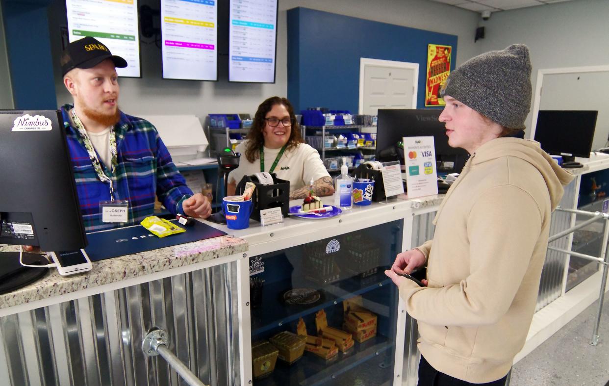 NAP Dispensary Budtenders Joseph Dunk and Allyson Thorley help William Belcher of Abington acquire some cannabis products on Wednesday, April 17, 2024. Belcher, who is 21, was impressed with the variety in the store.