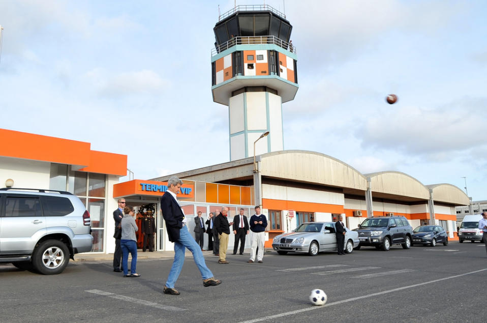 John Kerry kicking a soccer ball World Cupt 2014