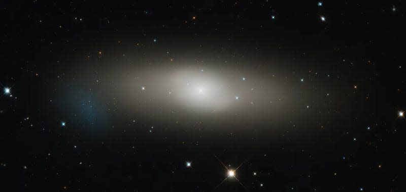 Another lenticular galaxy, NGC 1023, about 36 million light-years from Earth. - Image: <a class="link " href="https://science.nasa.gov/missions/hubble/hubble-focuses-on-a-large-lenticular" rel="nofollow noopener" target="_blank" data-ylk="slk:NASA, ESA, and G. Sivakoff (University of Alberta); Image processing: G. Kober (NASA Goddard/Catholic University of America);elm:context_link;itc:0;sec:content-canvas">NASA, ESA, and G. Sivakoff (University of Alberta); Image processing: G. Kober (NASA Goddard/Catholic University of America)</a>