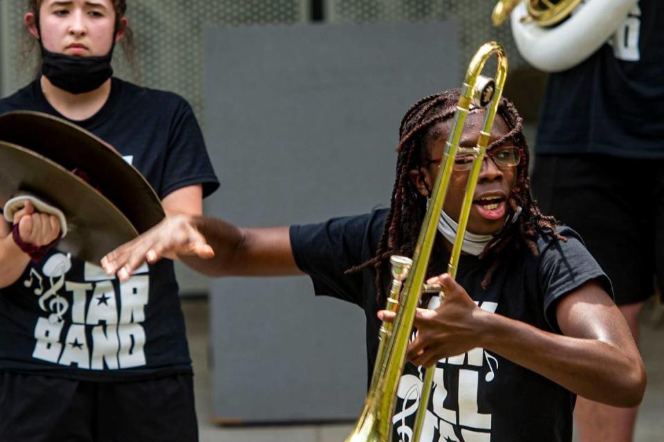 Members of the KCK All Star Band perform at the second annual Advocacy and Awareness Peace March and Rally on Juneteenth, Saturday, June 19, 2021, at Thompson Park in Overland Park, Kansas. Community members clapped and danced as the band performed.