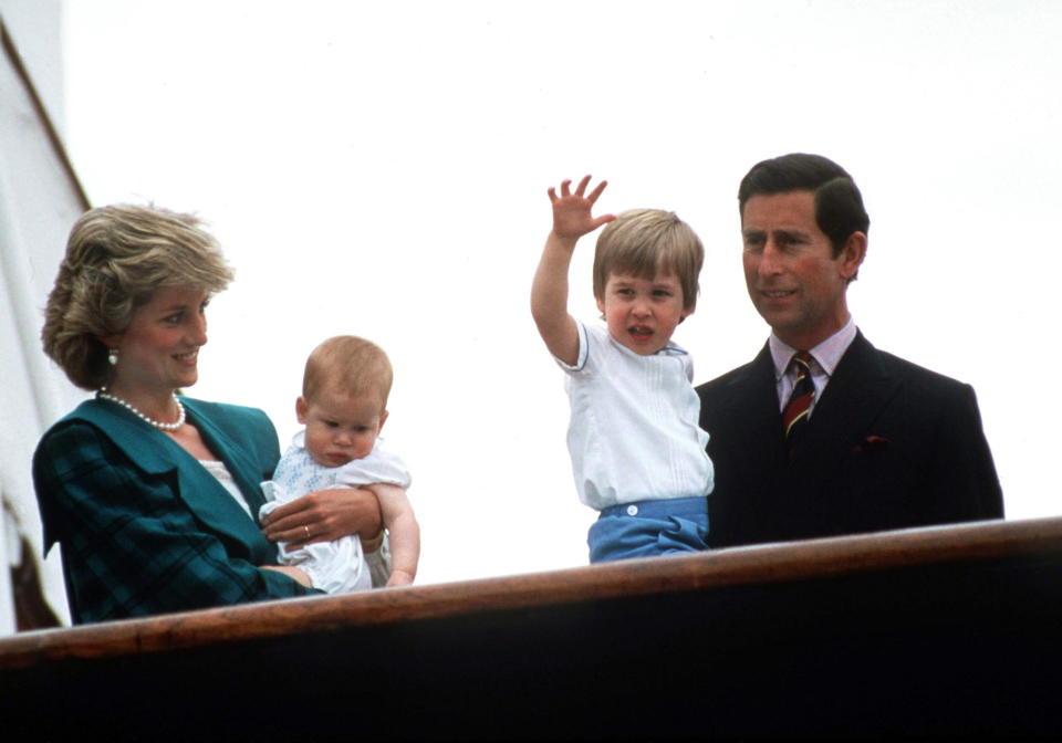 Princess Diana, Prince Harry, Prince William and Prince Charles wave from the Royal Yacht Britannia in Venice, Italy, on May 5, 1985.