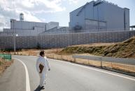 The Wider Image: The man who saves forgotten cats in Fukushima's nuclear zone