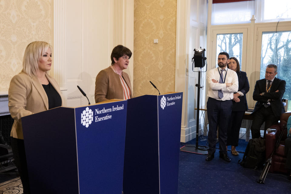 First Minster Arlene Foster (second from left) and Deputy First Minister Michelle OÕNeill (left) hold a joint press conference at Stormont Castle in Belfast to give an update on plans to tackle Coronavirus and announce school closures on Friday. (Photo by Liam McBurney/PA Images via Getty Images)