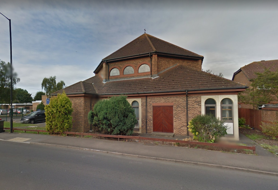 The woman has been attending funerals at the Holy Redeemer Church in Slough, Berkshire (Picture: Google)