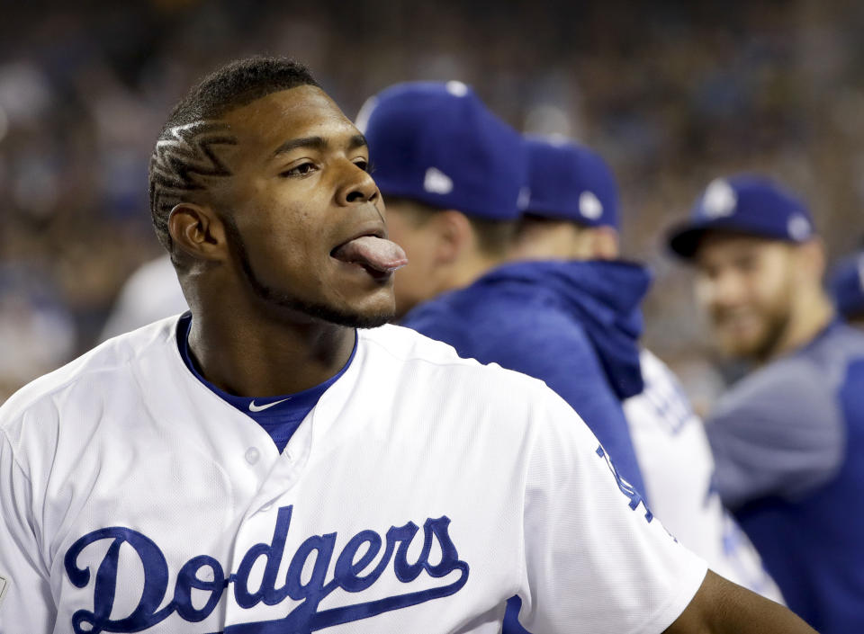 Yasiel Puig sticks out his tongue after hitting a home run against the Chicago Cubs during Game 1 of the NLCS in Los Angeles, Saturday, Oct. 14, 2017. (AP)