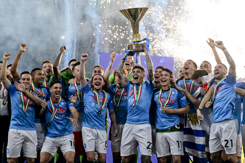 Napoli's players celebrate after winning the Serie A soccer title trophy at the Diego Maradona Stadium, in Naples, Sunday, June 4, 2023.(Ciro Fusco/ANSA, Pool Photo via AP)