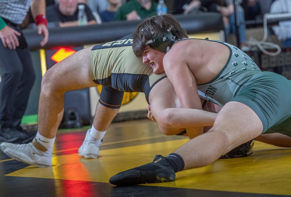 Delbarton heavyweight Connor Martin reverses Southern's Anthony Evangelista to his back for the pin. Delbarton won the match 48-12.