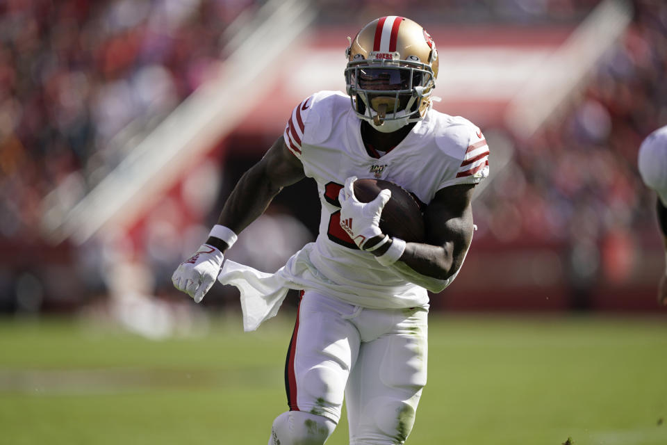 San Francisco 49ers running back Tevin Coleman runs with ball for a touchdown during the first half of an NFL football game against the Carolina Panthers Santa Clara, Calif., Sunday, Oct. 27, 2019. (AP Photo/Tony Avelar)