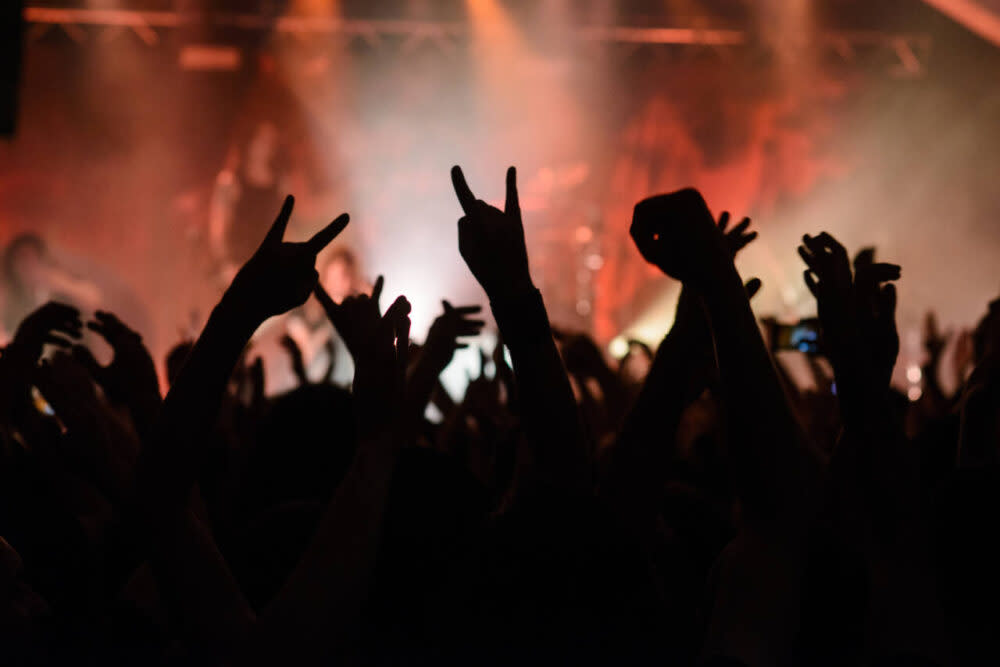 Hands raised at rock concert