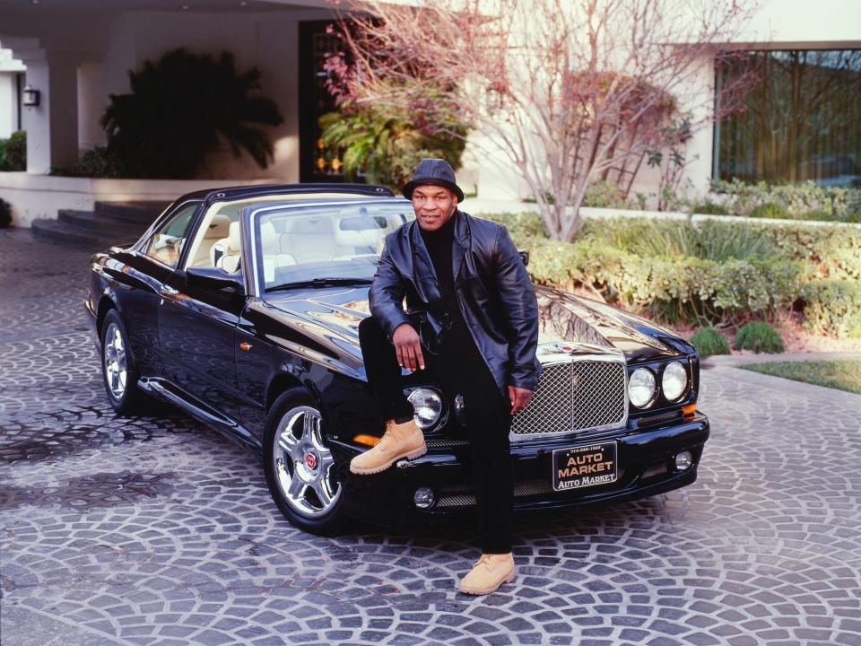 Mike Tyson and his Bentley in 2000.