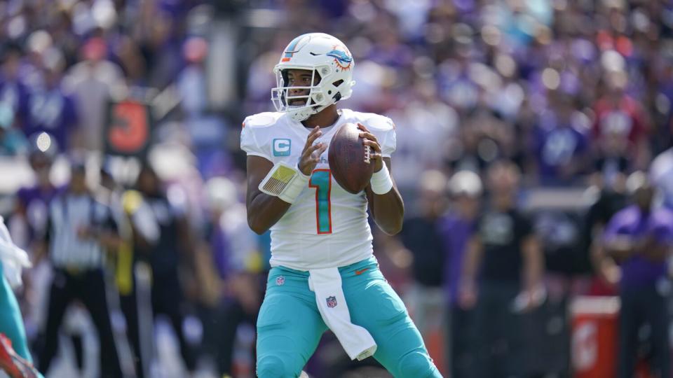 Miami Dolphins quarterback Tua Tagovailoa throws a pass.