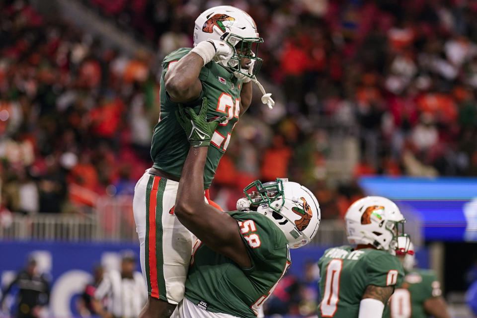 Florida A&M running back Terrell Jennings (23) celebrates his touchdown against Howard during the first half of an NCAA Celebration Bowl football game, Saturday, Dec. 16, 2023, in Atlanta. (AP Photo/Mike Stewart)