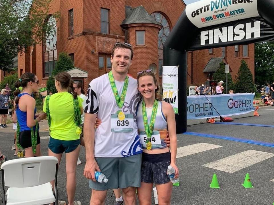 Emma Atwell and Justin Wagers after finishing a running race.