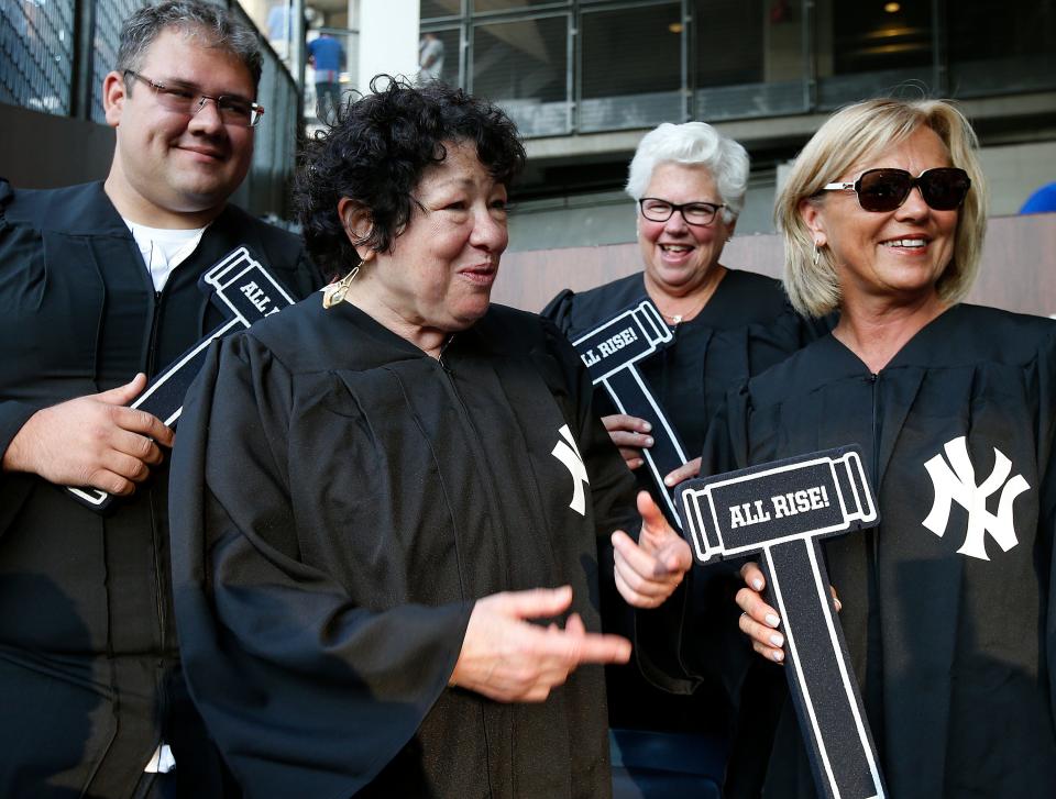 Sonia Sotomayor, a New York Yankees fan, talks with fans in the 