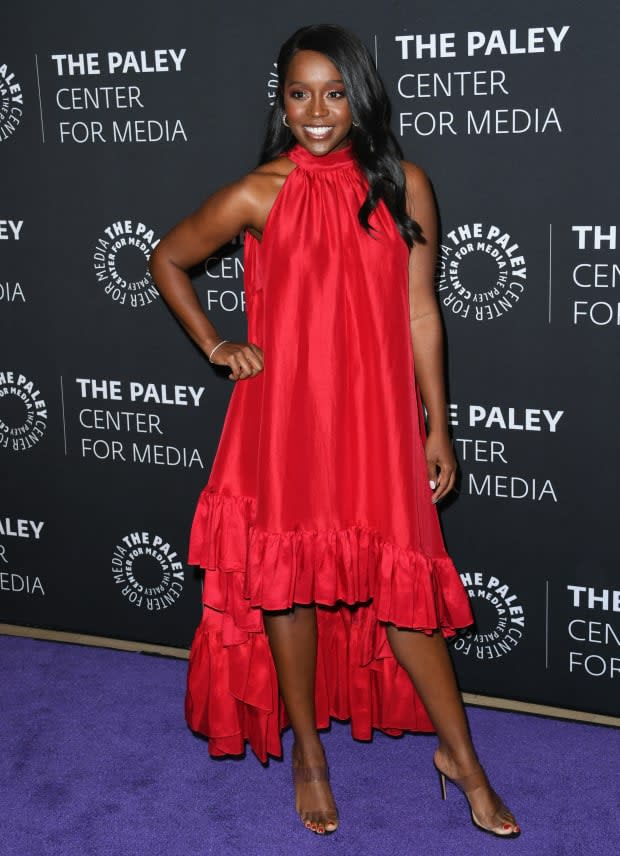 Aja Naomi King in Azeeza to a red carpet in 2019. 