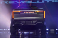 The Ram 1500 Revolution electric battery powered pickup truck is displayed on stage during the Stellantis keynote at the CES tech show Thursday, Jan. 5, 2023, in Las Vegas. (AP Photo/John Locher)