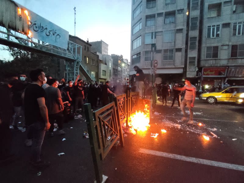 FILE PHOTO: Protest over the death of Mahsa Amini, a woman who died after being arrested by the Islamic republic's "morality police", in Tehran