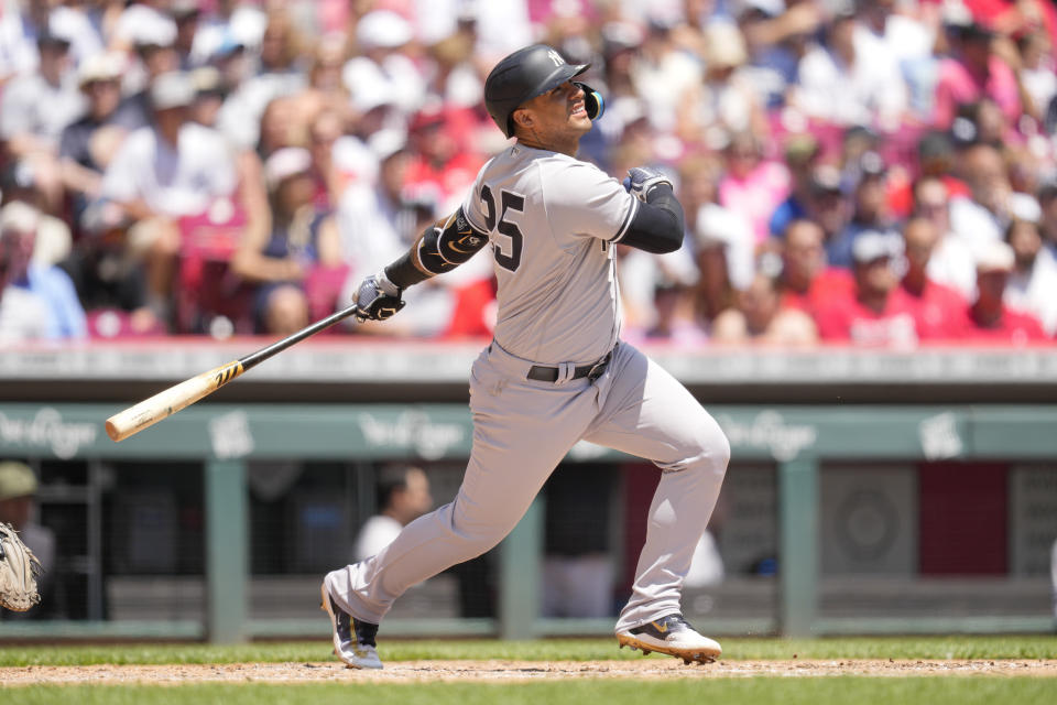 New York Yankees' Gleyber Torres watches his solo home run against the Cincinnati Reds in the sixth inning of a baseball game in Cincinnati, Sunday, May 21, 2023. (AP Photo/Jeff Dean)