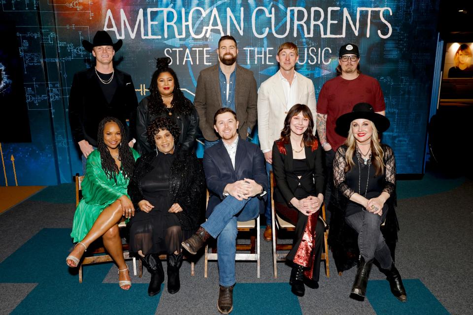 (Back row L-R) Parker McCollum, Holly G, Jordan Davis, Ashley Gorley, HARDY, (front row L-R) Miko Marks, Frankie Staton, Scotty McCreery, Molly Tuttle â€‹and Sunny Sweeney attend Country Music Hall of Fame and Museum's opening of American Currents: State of the Music on March 07, 2023 in Nashville, Tennessee.