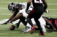 Atlanta Falcons linebacker LaRoy Reynolds (59) recoveres a fumble against the Las Vegas Raiders during the second half of an NFL football game, Sunday, Nov. 29, 2020, in Atlanta. (AP Photo/Brynn Anderson)