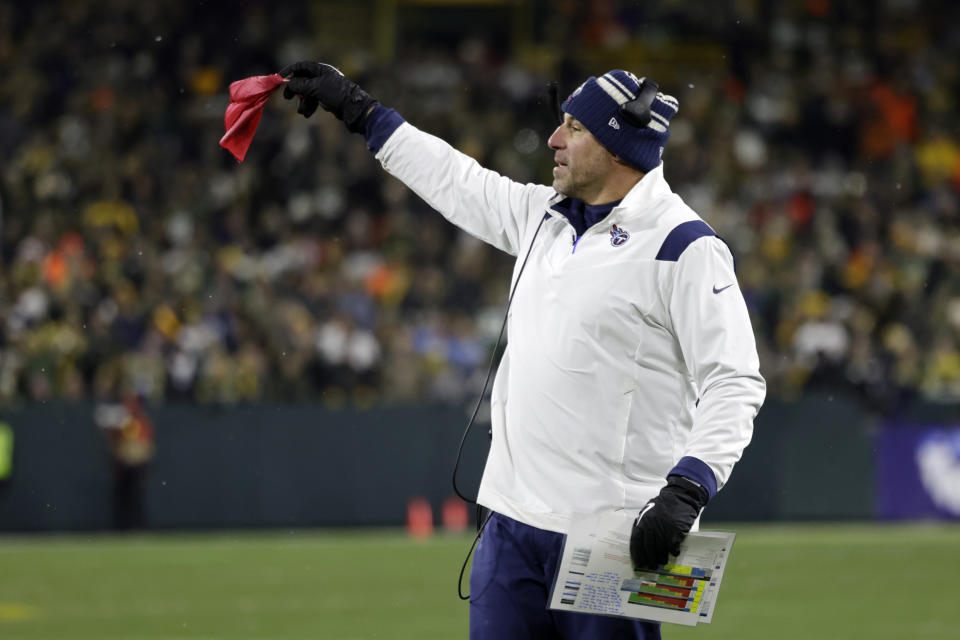 Tennessee Titans head coach Mike Vrabel challenges a call during the second half of an NFL football game against the Green Bay Packers Thursday, Nov. 17, 2022, in Green Bay, Wis. (AP Photo/Matt Ludtke)