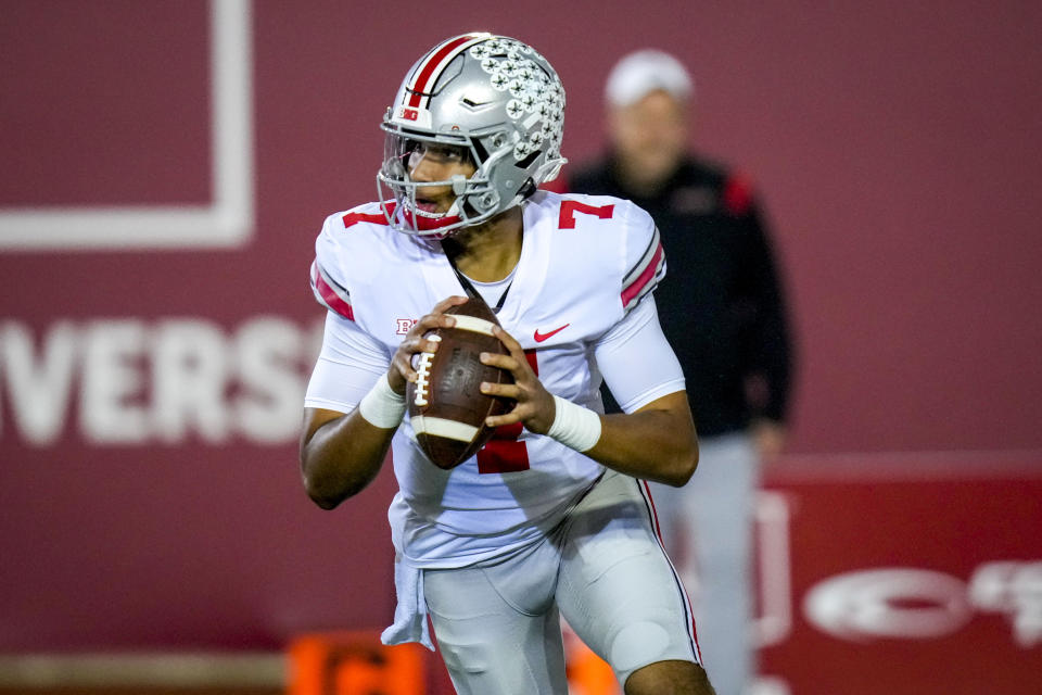 Ohio State quarterback C.J. Stroud (7) looks to throw during warmups before playing Indiana in an NCAA college football game in Bloomington, Ind., Saturday, Oct. 23, 2021. (AP Photo/AJ Mast)