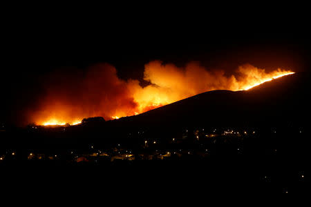 View of a fire in Sintra mountain, Portugal October 7, 2018. REUTERS/Pedro Nunes